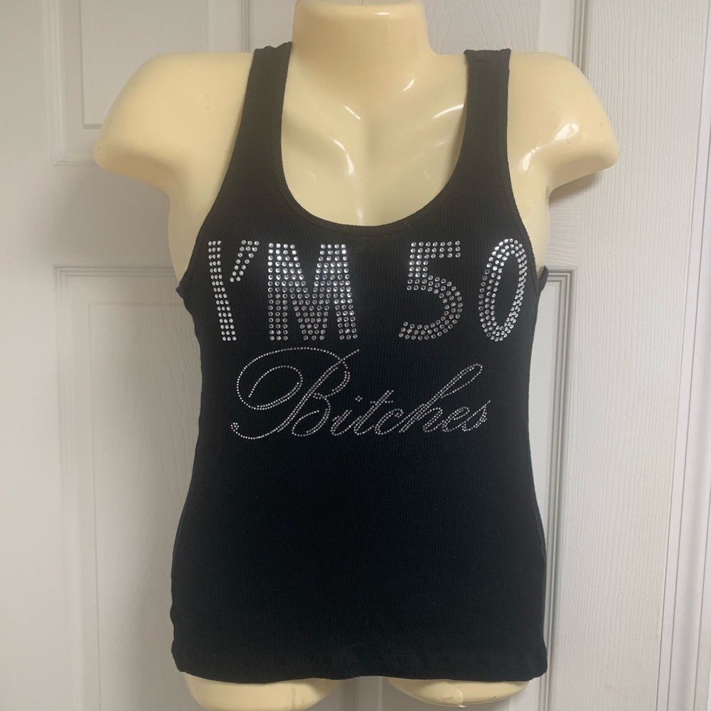 Show off being 50 with this fun black ribbed tank with lots of bling!